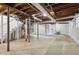 Unfinished basement with utilities, exposed pipes, and a blank canvas for customization at 1753 Detroit Nw Ave, Atlanta, GA 30314