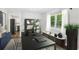 Elegant dining room with a modern table, decorative shelving, and natural light at 1753 Detroit Nw Ave, Atlanta, GA 30314