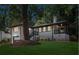Charming exterior elevation featuring a garage and landscaped front yard at 1753 Detroit Nw Ave, Atlanta, GA 30314
