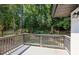 Outdoor patio area overlooking a lush backyard and green trees, perfect for relaxation at 1753 Detroit Nw Ave, Atlanta, GA 30314
