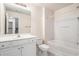 Well-lit bathroom featuring a shower-tub combo and single sink vanity at 1960 Dakota Nw Dr, Acworth, GA 30101