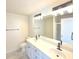 Bathroom featuring marble tile flooring, dual sinks, shower and tub with modern fixtures at 1960 Dakota Nw Dr, Acworth, GA 30101