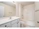 Bathroom with a shower-tub combo and white vanity at 1960 Dakota Nw Dr, Acworth, GA 30101