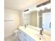 Updated bathroom with a double sink vanity, large mirror, modern lighting, and a bathtub/shower combination at 1960 Dakota Nw Dr, Acworth, GA 30101