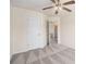 This carpeted bedroom has a ceiling fan and access to the bathroom through the doorway at 1960 Dakota Nw Dr, Acworth, GA 30101