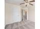 Bright bedroom features a ceiling fan and carpeted floor at 1960 Dakota Nw Dr, Acworth, GA 30101