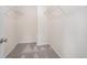 Walk-in closet featuring carpeted floors and metal shelving at 1960 Dakota Nw Dr, Acworth, GA 30101