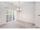 Empty dining area with sliding doors and a chandelier at 1960 Dakota Nw Dr, Acworth, GA 30101