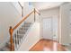 Welcoming entryway features hardwood floors, staircase, and plenty of natural light at 1960 Dakota Nw Dr, Acworth, GA 30101