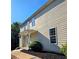 Charming two-story home with a welcoming front porch and neatly landscaped front yard at 1960 Dakota Nw Dr, Acworth, GA 30101