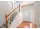 Inviting foyer with hardwood floors, staircase, and natural light at 1960 Dakota Nw Dr, Acworth, GA 30101
