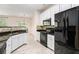 Modern kitchen features granite countertops, stainless steel appliances, and tile backsplash at 1960 Dakota Nw Dr, Acworth, GA 30101