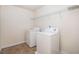 Laundry room with washer, dryer, and shelving at 1960 Dakota Nw Dr, Acworth, GA 30101