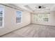 Spacious primary bedroom with large windows and tray ceiling at 1960 Dakota Nw Dr, Acworth, GA 30101