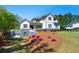 Beautiful two-story home boasting modern farmhouse design and colorful landscaping at 5138 Price Dr, Suwanee, GA 30024
