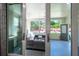 Covered patio features outdoor seating, a fireplace, and views of the landscaped backyard at 5138 Price Dr, Suwanee, GA 30024