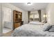 Bedroom featuring two beds, a built-in desk and shelving, and a window for natural light at 1020 Burton Ne Dr, Atlanta, GA 30329