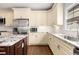 Elegant kitchen with custom cabinets, granite countertops, and stainless steel appliances at 1020 Burton Ne Dr, Atlanta, GA 30329