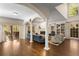 Bright living room with fireplace, hardwood floors, and sliding doors to outdoor living space at 1020 Burton Ne Dr, Atlanta, GA 30329