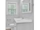 Bright bathroom featuring a white vanity with a large mirror and brushed nickel faucet at 1093 Lanier Sw Dr, Marietta, GA 30060