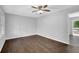 Bedroom featuring beautiful hard wood floors, a ceiling fan, and fresh paint at 1093 Lanier Sw Dr, Marietta, GA 30060