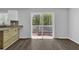 Bright eat-in kitchen with access to outdoor deck and neutral colors at 1093 Lanier Sw Dr, Marietta, GA 30060