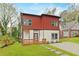 Charming home with a combination of red and white siding, complemented by a cozy front porch and stepping stone path at 2166 Belvedere Sw Ave, Atlanta, GA 30311