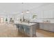 Modern kitchen featuring an island with barstool seating and stainless steel appliances at 2166 Belvedere Sw Ave, Atlanta, GA 30311