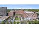 An aerial view of Ponce City Market with the Atlanta skyline in the background on a clear, sunny day at 978 North Ne Ave # 207, Atlanta, GA 30306