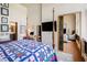Spacious bedroom with hardwood floors, exposed brick walls, and ample natural light at 978 North Ne Ave # 207, Atlanta, GA 30306