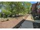 Front yard with a sidewalk leading up to a building, showcasing the property's welcoming curb appeal at 978 North Ne Ave # 207, Atlanta, GA 30306