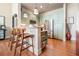 Kitchen showcases modern appliances, sage green cabinets and a breakfast bar at 978 North Ne Ave # 207, Atlanta, GA 30306