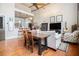 Inviting open-concept living space with hardwood floors, comfortable seating, and a dining area at 978 North Ne Ave # 207, Atlanta, GA 30306