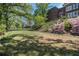 Expansive yard with lush grass and mature trees, offering plenty of space for outdoor activities and relaxation at 978 North Ne Ave # 207, Atlanta, GA 30306