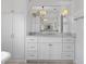 Bright bathroom features a double vanity with large mirrors and linen closet at 1116 Dan Johnson Ne Rd, Atlanta, GA 30307
