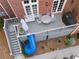 Aerial view of back deck with outdoor table, chairs, stairs, and ' slide at 1116 Dan Johnson Ne Rd, Atlanta, GA 30307