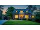 Charming brick home with manicured lawn, lush landscaping, and inviting entrance, perfect for suburban living at 1116 Dan Johnson Ne Rd, Atlanta, GA 30307