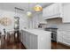Open-concept kitchen with an island, stainless steel appliances, and dining area at 1116 Dan Johnson Ne Rd, Atlanta, GA 30307