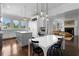 Eat-in kitchen featuring an island, stainless appliances and view to living room at 1116 Dan Johnson Ne Rd, Atlanta, GA 30307
