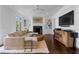 Spacious living room features a fireplace, built-in shelves, and plush seating at 1116 Dan Johnson Ne Rd, Atlanta, GA 30307