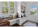Mudroom with built-in storage, a bench, and natural light from a window at 1116 Dan Johnson Ne Rd, Atlanta, GA 30307