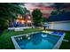 Stunning backyard featuring a luxurious swimming pool and hot tub, perfect for outdoor relaxation and entertainment at 1116 Dan Johnson Ne Rd, Atlanta, GA 30307