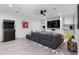 Recreation room with comfortable sofa, foosball table, and wall-mounted television at 1116 Dan Johnson Ne Rd, Atlanta, GA 30307
