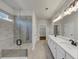 Spacious bathroom with a glass shower and long vanity with double sinks at 348 Ellington Dr, Canton, GA 30115