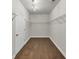 Walk-in closet with hardwood floors and wire shelving at 348 Ellington Dr, Canton, GA 30115