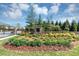 Entryway to Brayden Park, enhanced by vibrant foliage and greenery at 348 Ellington Dr, Canton, GA 30115