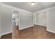 An airy living room featuring beautiful hardwood floors and elegant trim work throughout the space at 348 Ellington Dr, Canton, GA 30115
