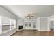 Cozy living room with fireplace, hardwood floors, and natural light at 348 Ellington Dr, Canton, GA 30115