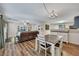 Open-concept living space with a dining area that flows into a living room, perfect for modern living at 373 Hidden Creek Ln, Canton, GA 30114