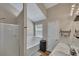 En-suite bath with a soaking tub, stand up shower, and double sink vanity at 373 Hidden Creek Ln, Canton, GA 30114